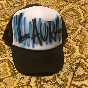 Custom Airbrush Scratch Design Blue and Black Trucker Hat with the name Laura